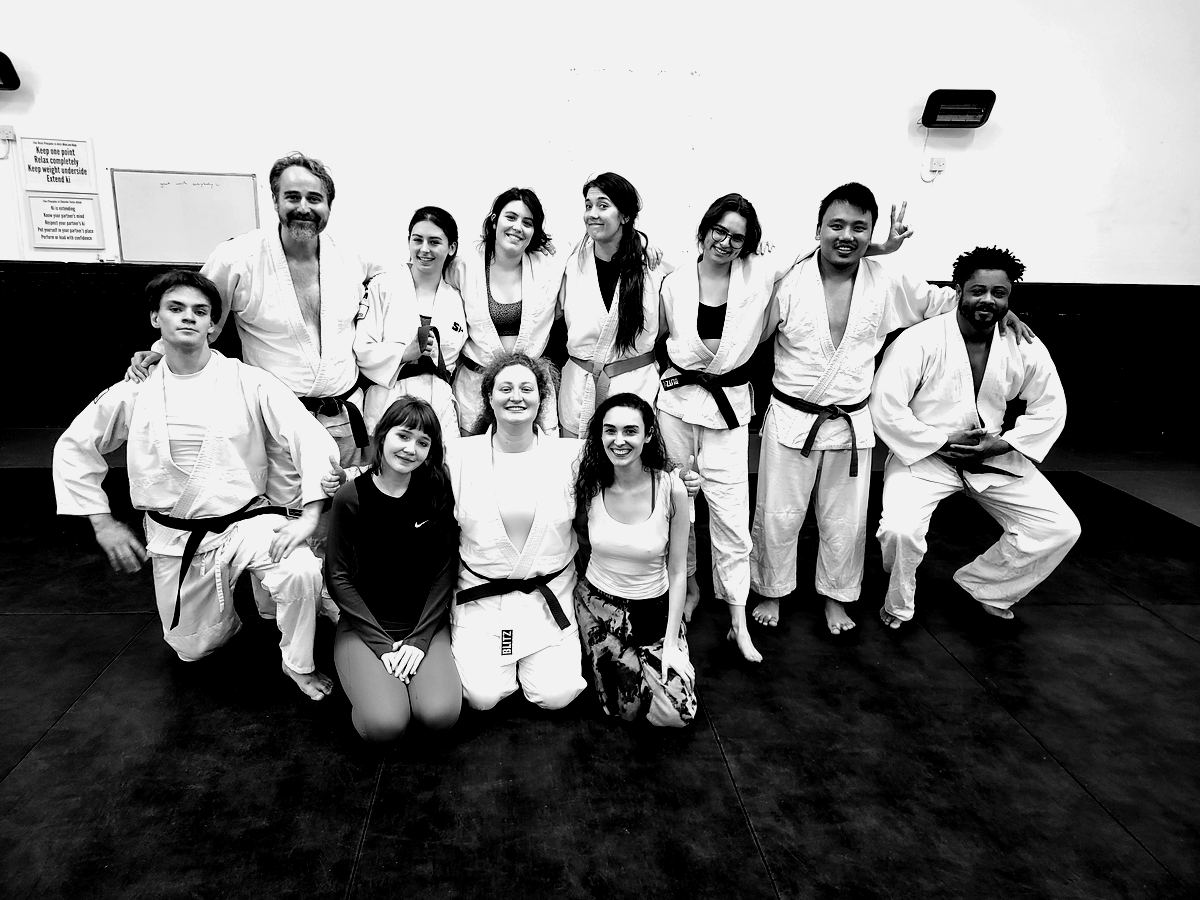 Group photo of the club in gis at the Brighton Ki Centre