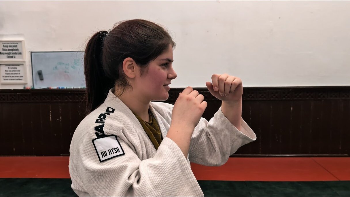 Hands up in a training guard